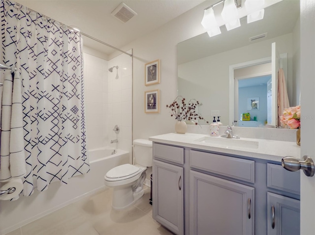 full bathroom featuring vanity, tile patterned floors, toilet, and shower / bath combo