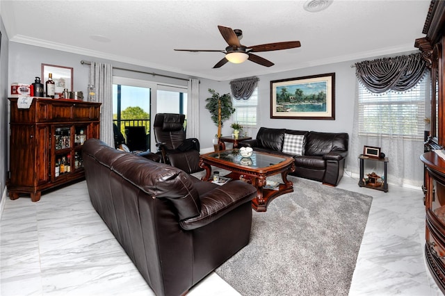 living room with ceiling fan, crown molding, and a textured ceiling