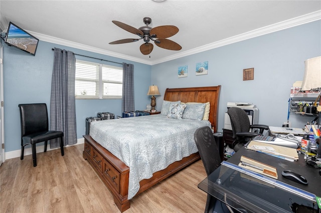 bedroom with crown molding, ceiling fan, and light hardwood / wood-style floors