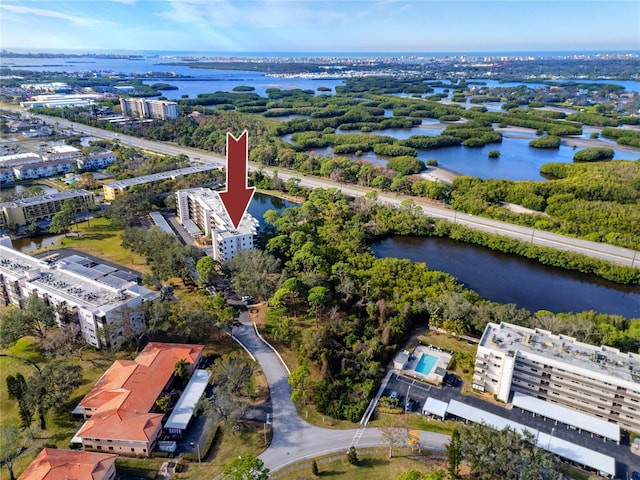 birds eye view of property featuring a water view