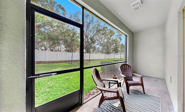 sunroom / solarium with visible vents