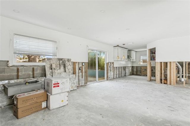 unfurnished living room with plenty of natural light