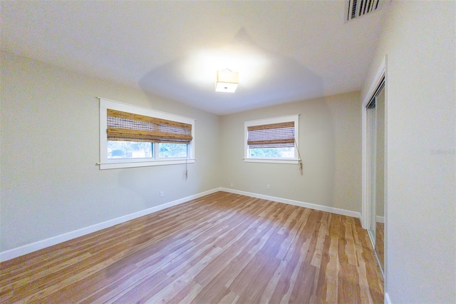 unfurnished bedroom featuring light hardwood / wood-style floors