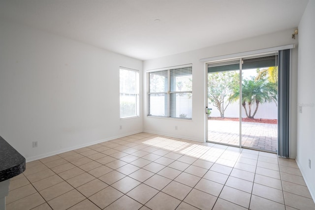 view of tiled spare room