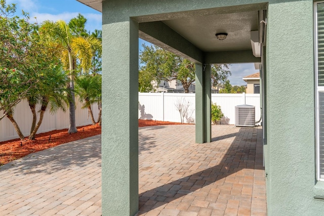 view of patio with central AC unit