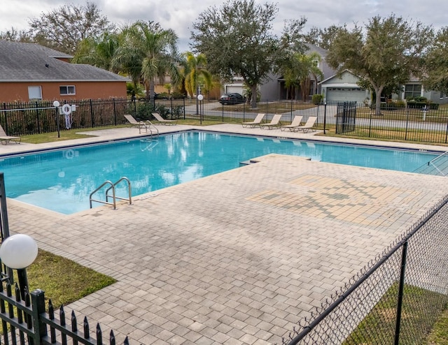 view of pool with a patio