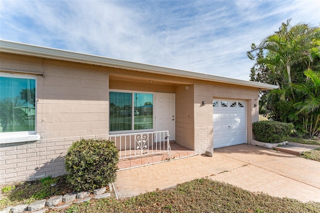 view of front of home featuring a garage