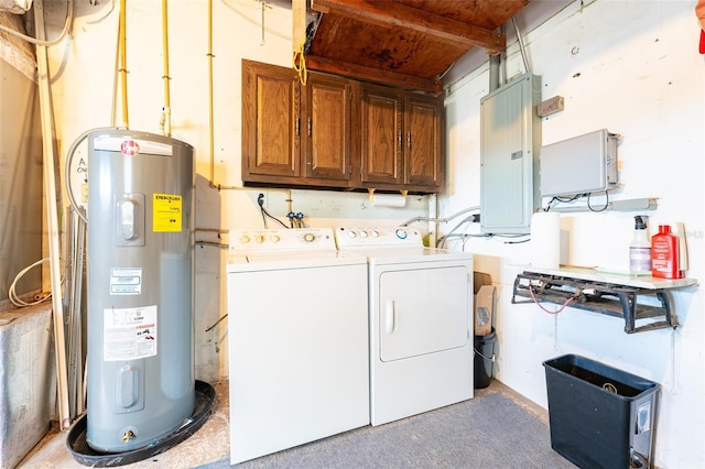 laundry area with cabinets, electric panel, washer and clothes dryer, and water heater