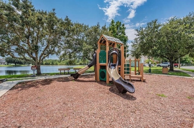 view of jungle gym featuring a water view