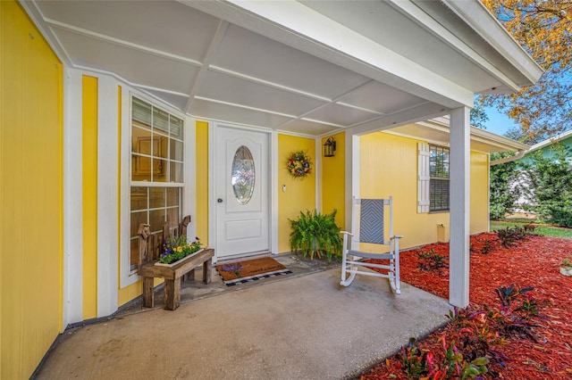 entrance to property with covered porch