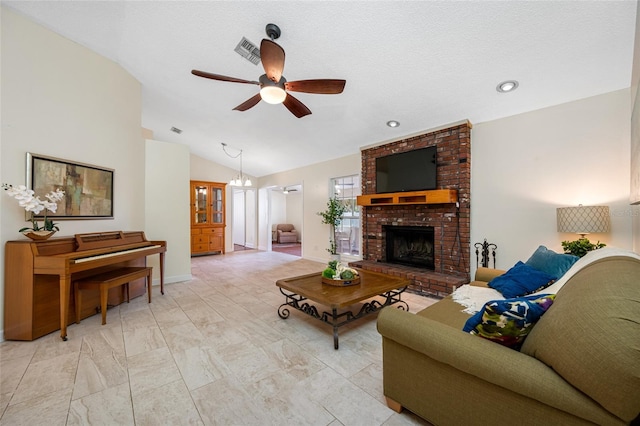 living room with lofted ceiling, a textured ceiling, a fireplace, and ceiling fan