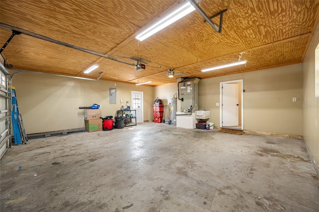 garage with water heater, a garage door opener, heating unit, and electric panel