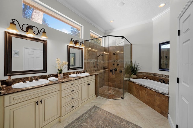 bathroom featuring vanity, ornamental molding, plus walk in shower, and a textured ceiling