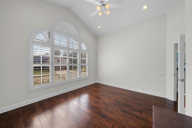 empty room with dark wood-type flooring, vaulted ceiling, and ceiling fan