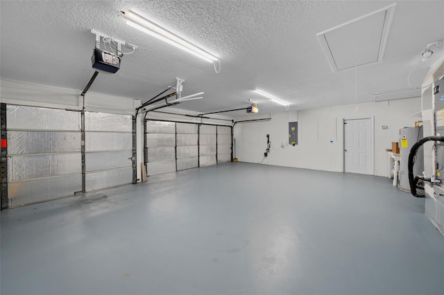 garage featuring a garage door opener, electric panel, and water heater