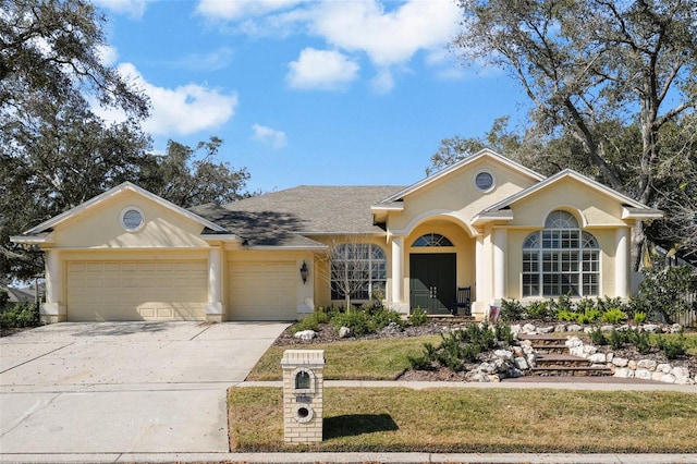 ranch-style home with a garage