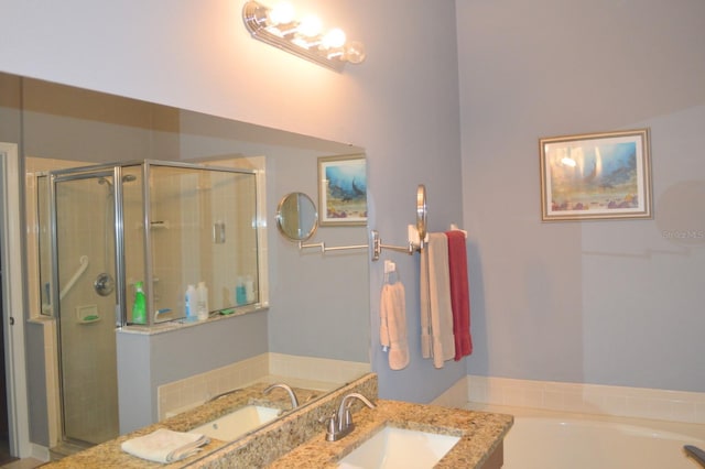 bathroom with vanity and an enclosed shower