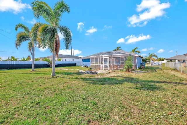 view of yard featuring a lanai