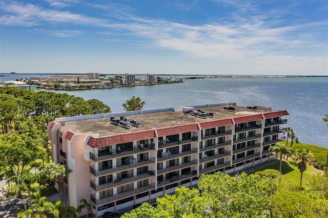 birds eye view of property with a water view