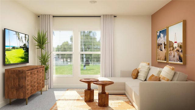 living area with light colored carpet