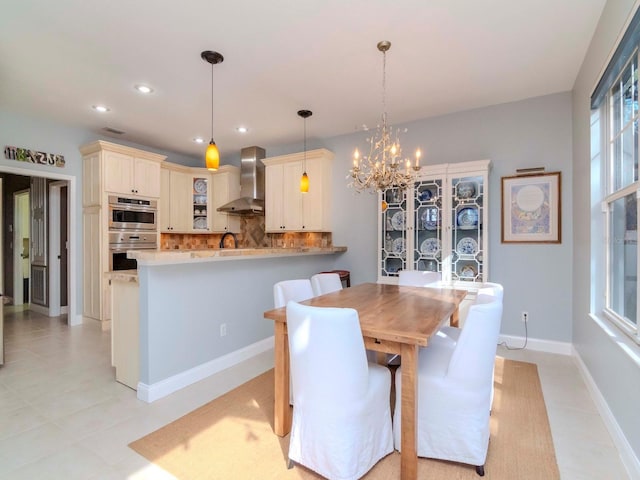 dining area with a chandelier