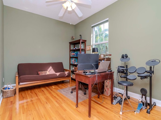 office space with hardwood / wood-style flooring and ceiling fan