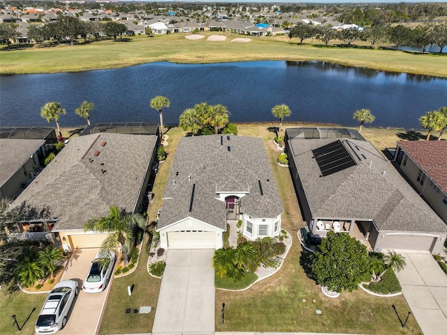 bird's eye view with a water view