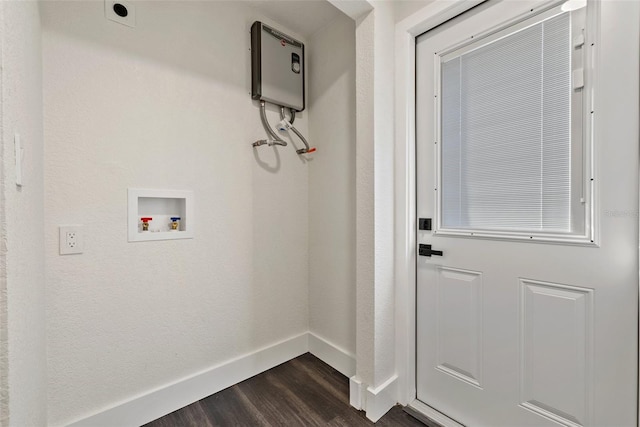 laundry room with laundry area, dark wood-style flooring, hookup for a washing machine, and baseboards