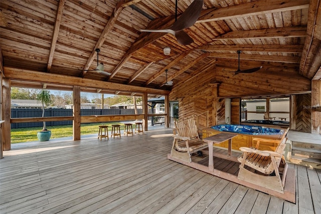 exterior space featuring fence and a ceiling fan