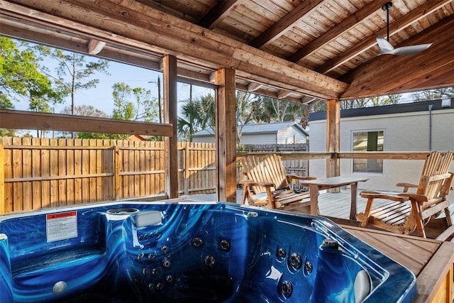 exterior space with a wealth of natural light, wood ceiling, and vaulted ceiling with beams