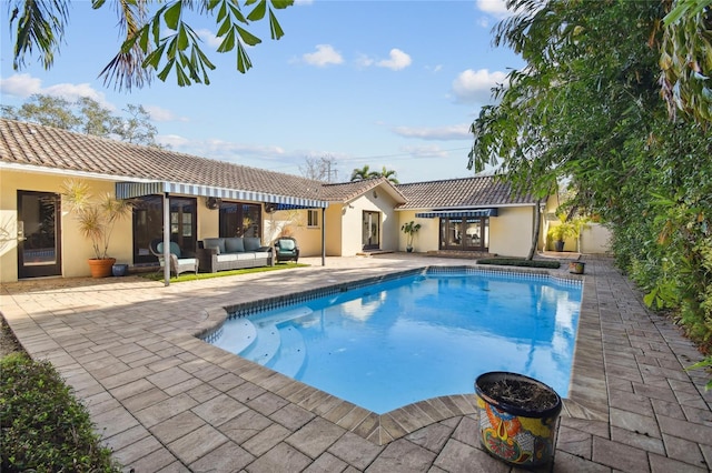 view of swimming pool with an outdoor hangout area and a patio