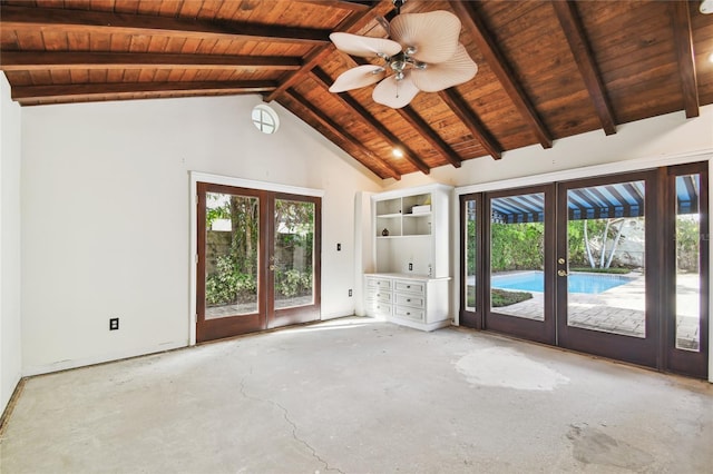 interior space with french doors, wood ceiling, a healthy amount of sunlight, and beam ceiling