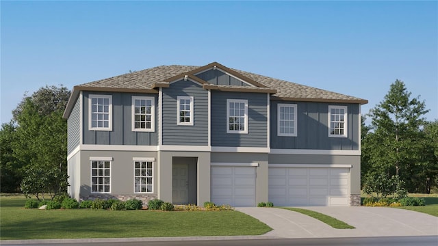 view of front facade with a garage and a front yard