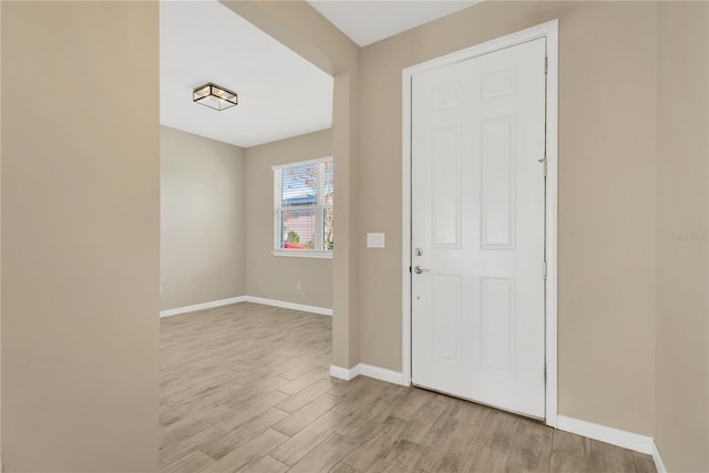 foyer with light hardwood / wood-style flooring