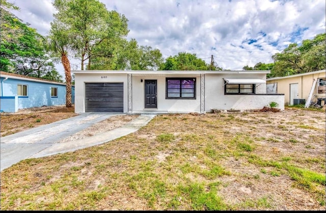 single story home with a garage