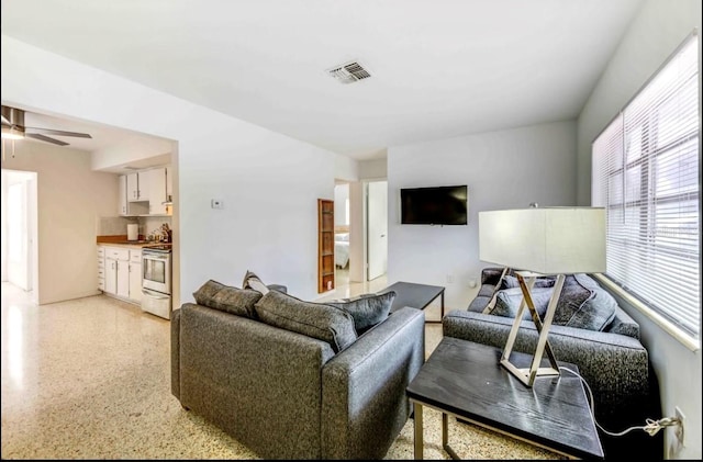 living room featuring ceiling fan