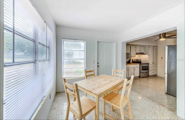 dining room featuring ceiling fan