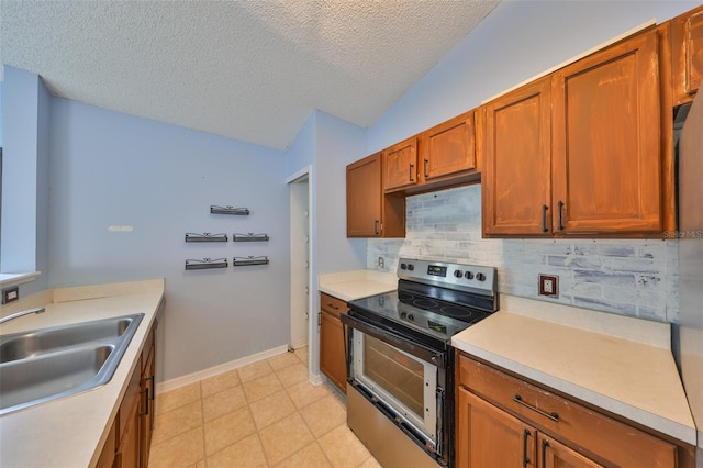 kitchen featuring lofted ceiling, sink, backsplash, a textured ceiling, and electric stove