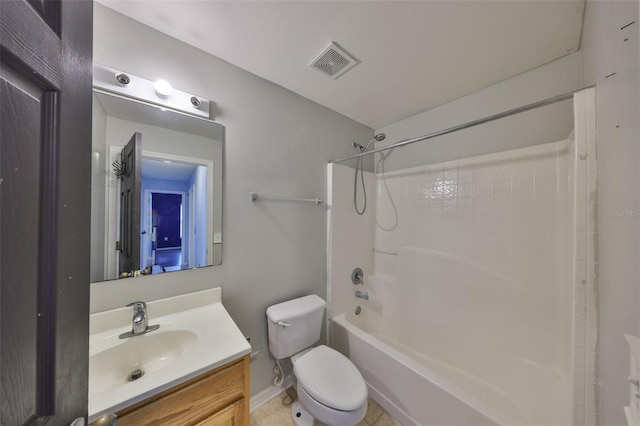 full bathroom featuring vanity, washtub / shower combination, and toilet