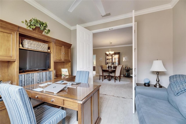 office space featuring an inviting chandelier, ornamental molding, and light wood-type flooring