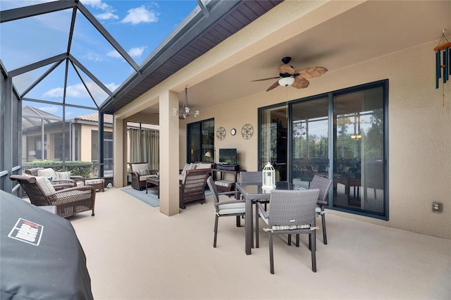 view of patio / terrace with an outdoor living space, a lanai, and ceiling fan