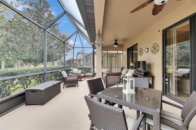 sunroom / solarium with ceiling fan