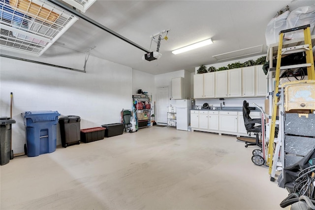 garage featuring a garage door opener