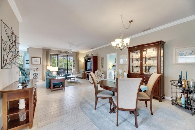 dining room with ornamental molding, ceiling fan with notable chandelier, and light hardwood / wood-style floors