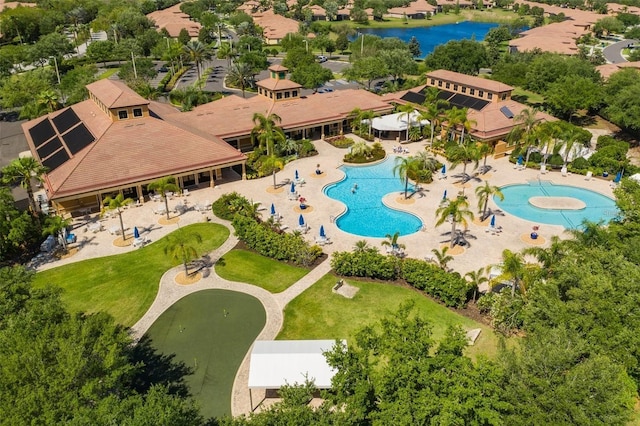 birds eye view of property featuring a water view