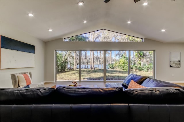 living room featuring vaulted ceiling