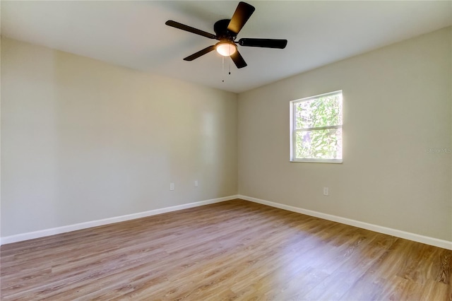 unfurnished room with light hardwood / wood-style floors and ceiling fan