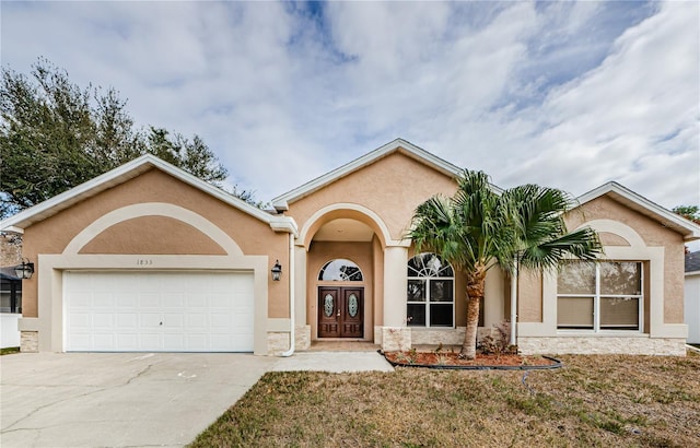 single story home with a garage