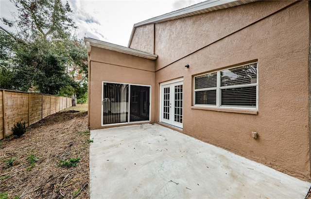 view of patio featuring french doors