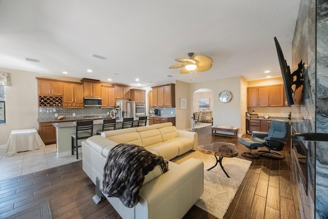 living room with ceiling fan